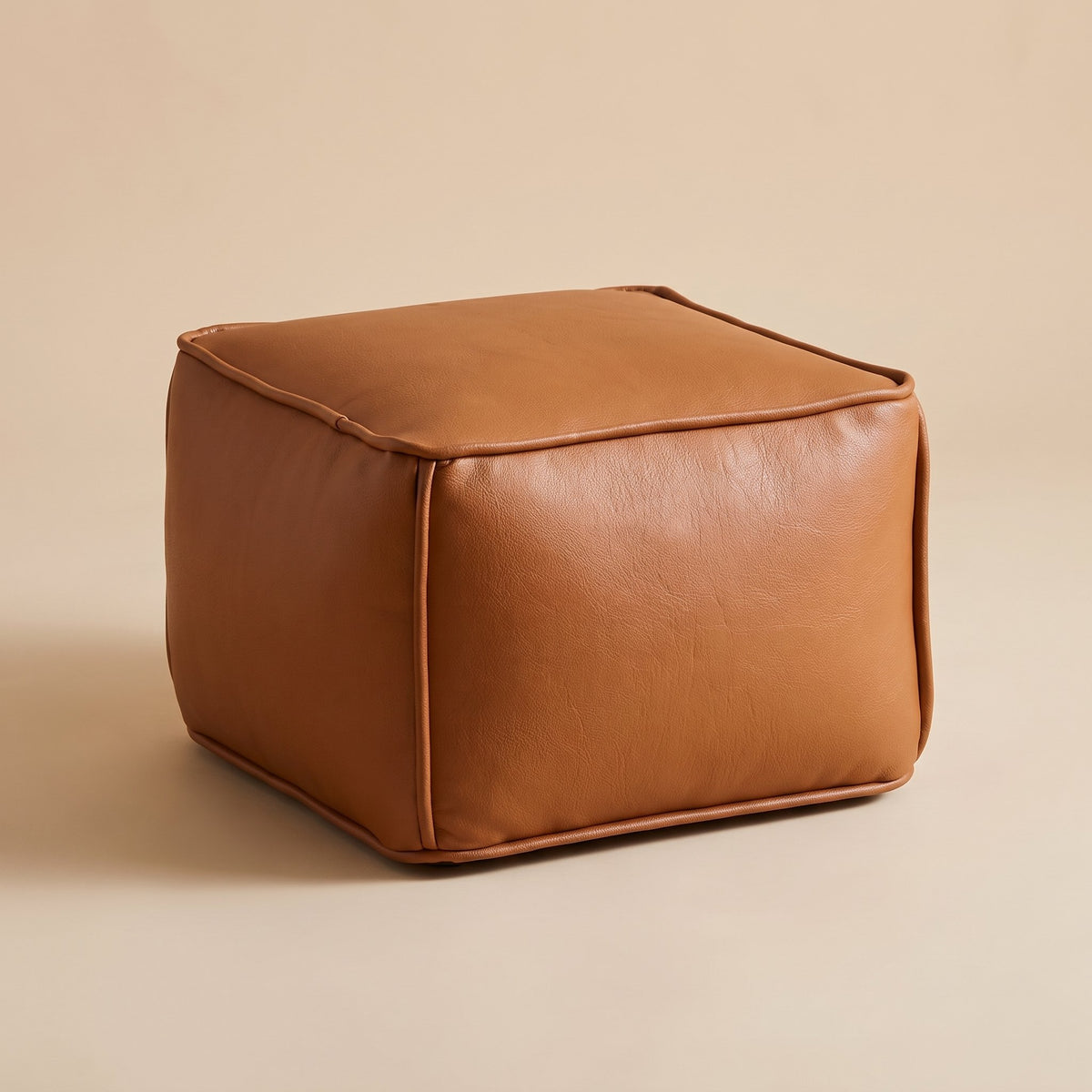 AURA | Chauffeuse pouf | Nomaï – Repose-pied cognac